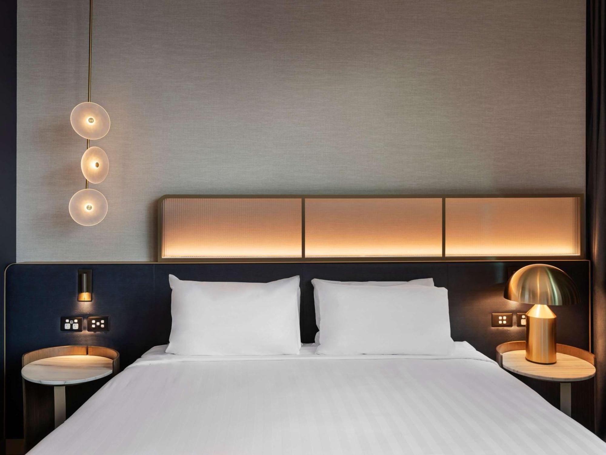 Hotel Pullman Auckland Airport Zewnętrze zdjęcie A bedroom at the hotel